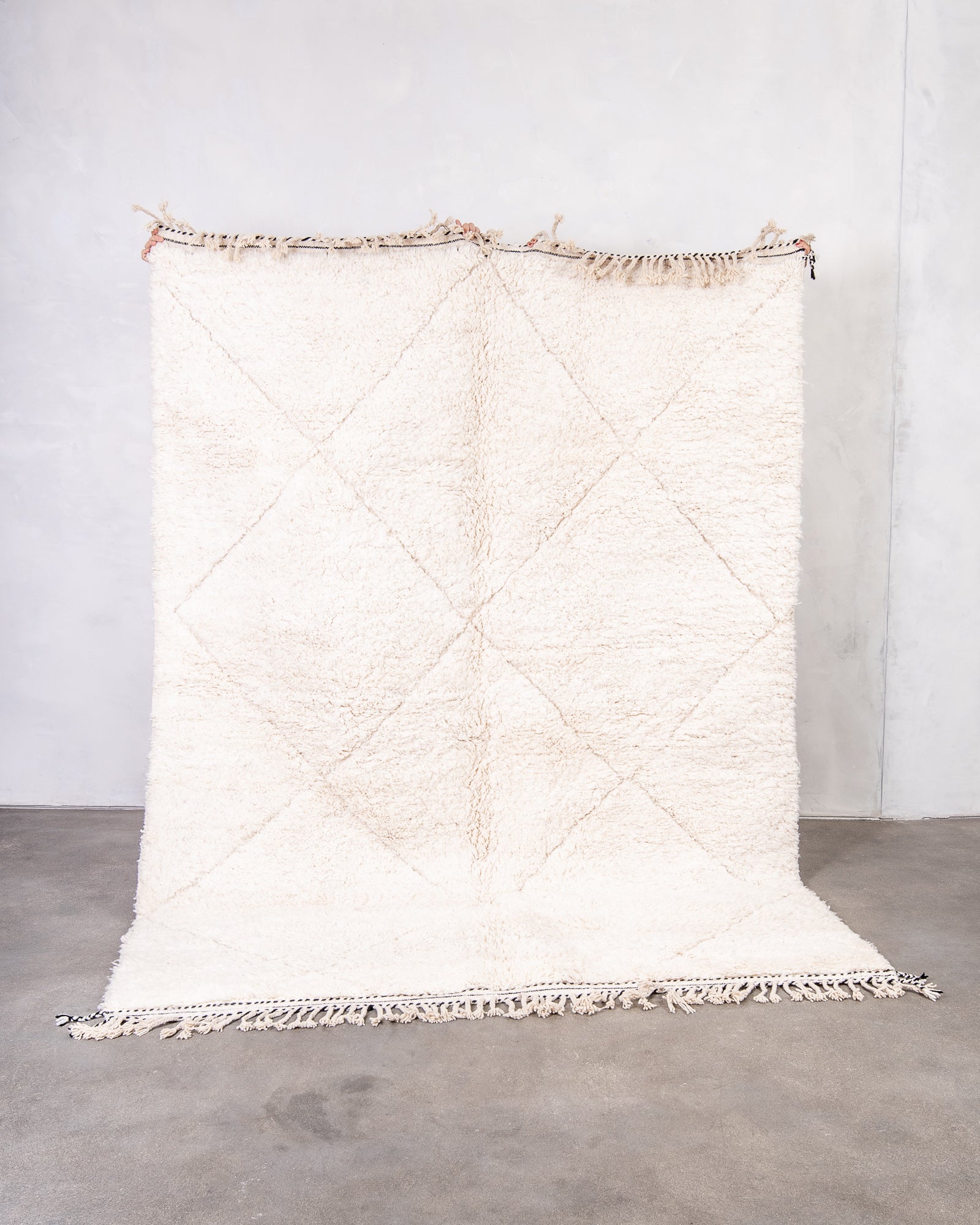 Modern, designer, handcrafted Berber rug from Morocco. Beniourain carpet with beautiful colours and patterns and fluffy wool texture.